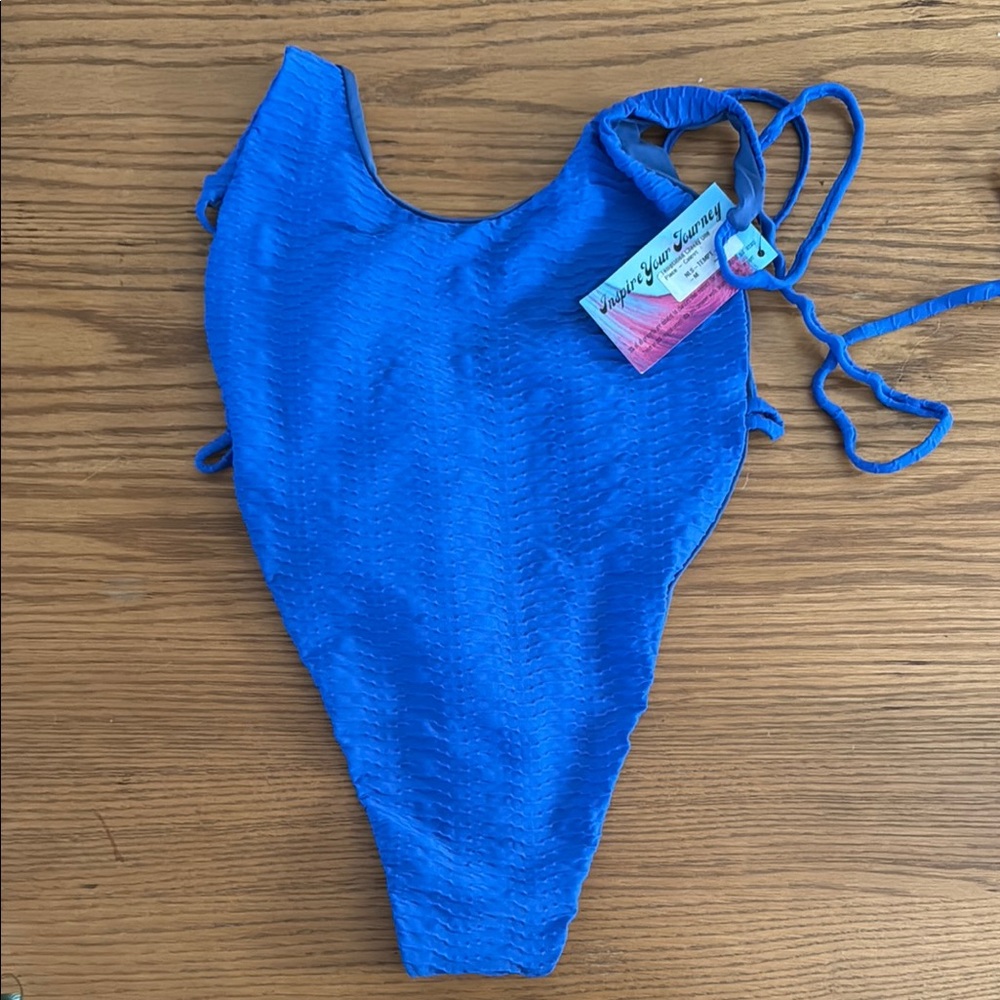 Brand new with Tags from Never lost swimwear (FRW ext.) size M